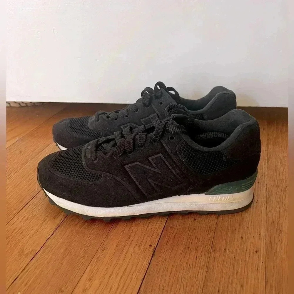 New Balance 574 Sonic Black 
Boys' Grade School size 4.5